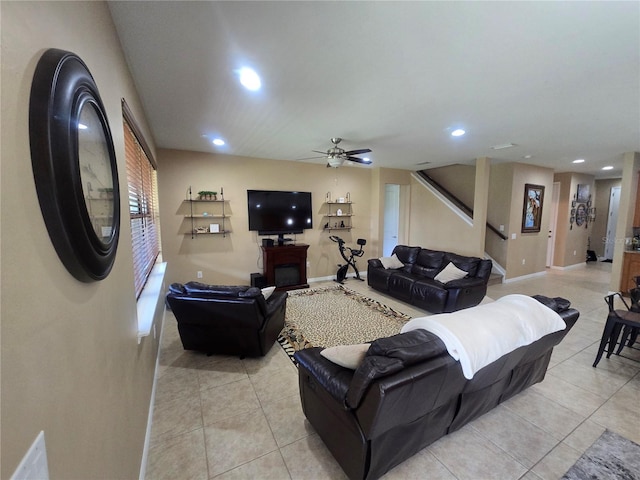 2739 Sherman Oak Dr, North Port, FL 34289 - living area with light tile patterned floors, a ceiling fan, recessed lighting, baseboards, and a glass covered fireplace