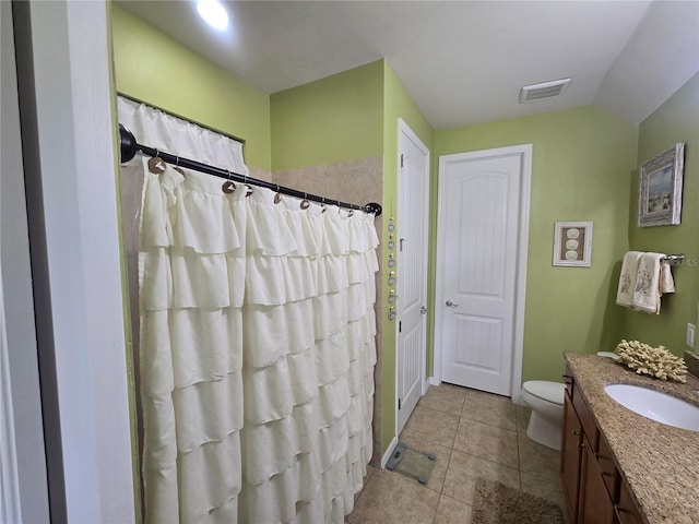 2739 Sherman Oak Dr, North Port, FL 34289 - full bath with vanity, toilet, tile patterned floors, and a shower with curtain