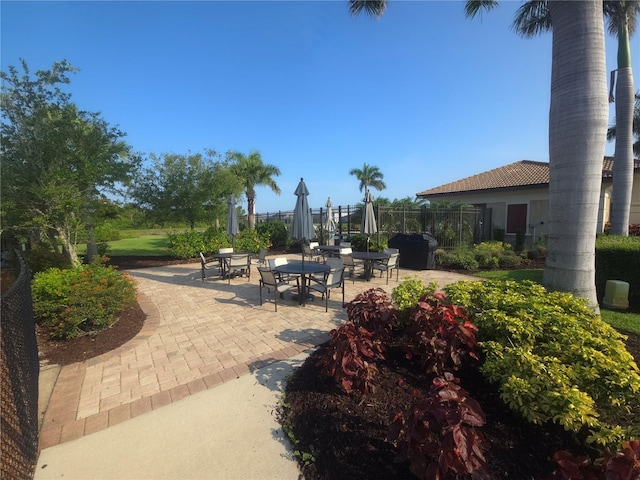 2739 Sherman Oak Dr, North Port, FL 34289 - view of community with a patio area and outdoor dining area