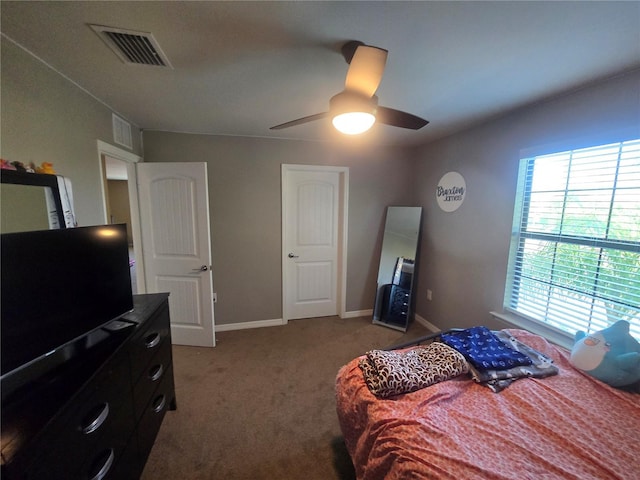 2739 Sherman Oak Dr, North Port, FL 34289 - bedroom featuring light colored carpet, a ceiling fan, and baseboards