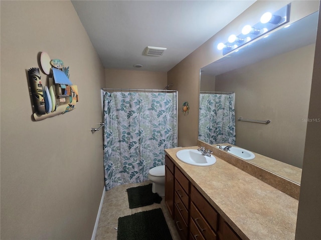 2739 Sherman Oak Dr, North Port, FL 34289 - bathroom with vanity, tile patterned floors, baseboards, toilet, and a shower with shower curtain