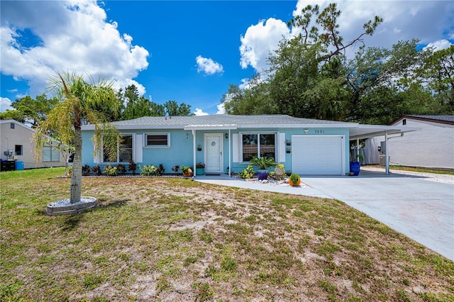 7231 Elyton Dr, North Port, FL 34287 - ranch-style house featuring an attached garage, a front yard, and driveway