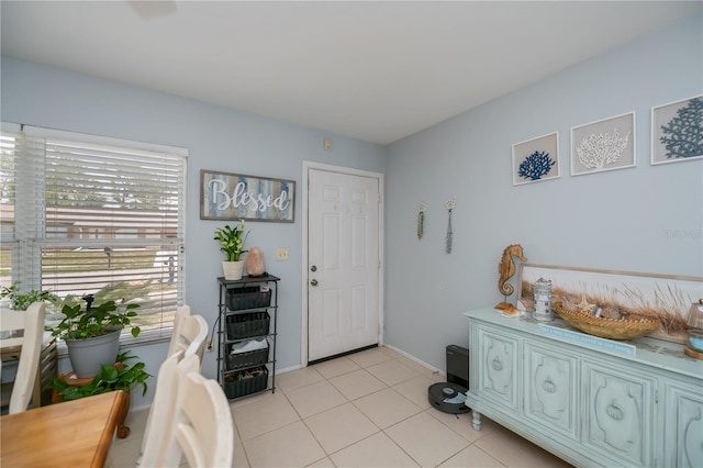 7231 Elyton Dr, North Port, FL 34287 - foyer entrance featuring baseboards and light tile patterned floors