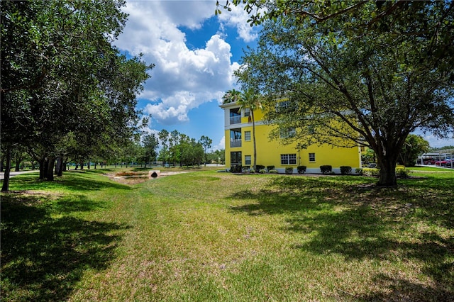 2060 Willow Hammock Cir Unit 301, Punta Gorda, FL 33983 - view of property's community featuring a lawn