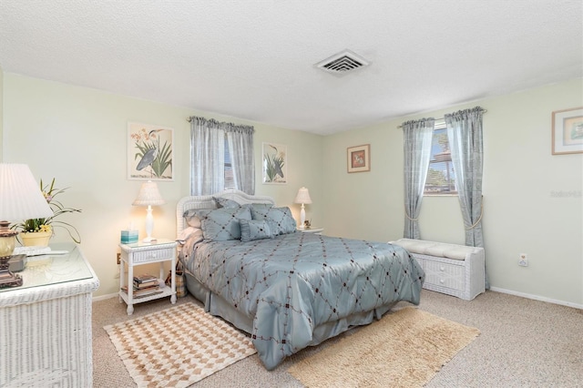 315 Holly Rd, Venice, FL 34293 - carpeted bedroom featuring baseboards and a textured ceiling