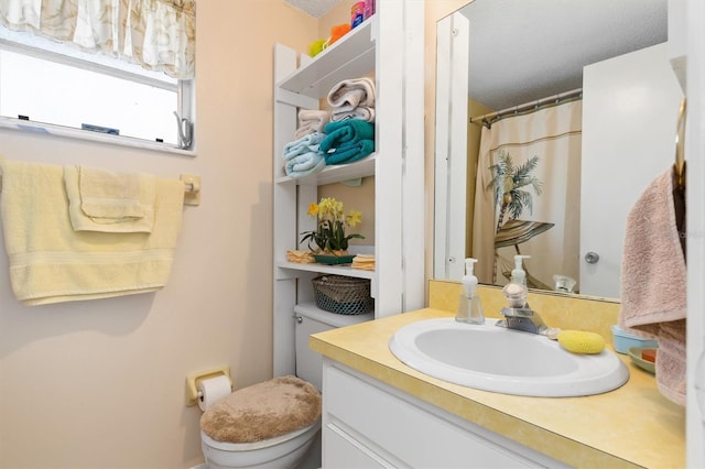 315 Holly Rd, Venice, FL 34293 - bathroom featuring toilet, vanity, and a shower with curtain