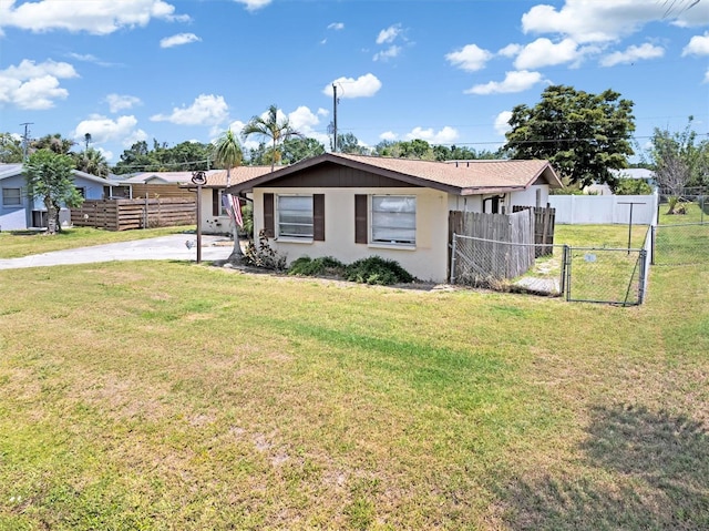 315 Holly Rd, Venice, FL 34293 - ranch-style home with concrete driveway and stucco siding