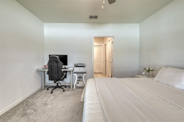 111 Rain Lily Ave, Spring Hill, FL 34609 - carpeted bedroom featuring an office area and a ceiling fan