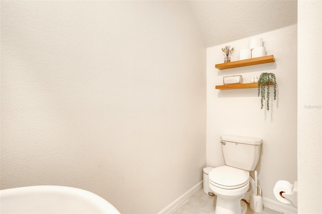 111 Rain Lily Ave, Spring Hill, FL 34609 - bathroom with tile patterned floors and lofted ceiling