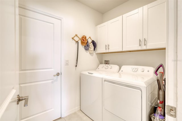 111 Rain Lily Ave, Spring Hill, FL 34609 - laundry room featuring cabinet space and independent washer and dryer