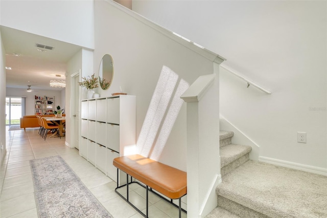 111 Rain Lily Ave, Spring Hill, FL 34609 - stairway featuring tile patterned flooring