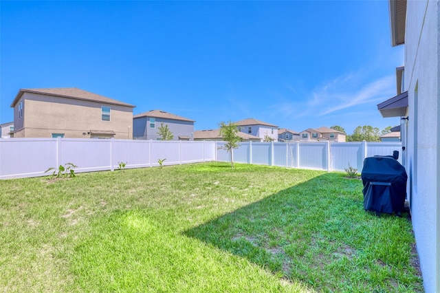 111 Rain Lily Ave, Spring Hill, FL 34609 - fenced backyard with a residential view