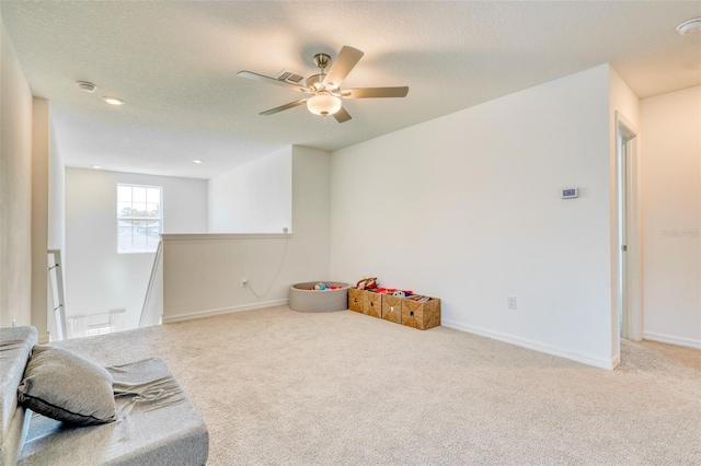 111 Rain Lily Ave, Spring Hill, FL 34609 - unfurnished room featuring an upstairs landing, carpet floors, a ceiling fan, and recessed lighting