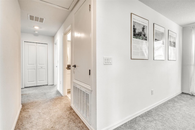 111 Rain Lily Ave, Spring Hill, FL 34609 - corridor with carpet floors and baseboards