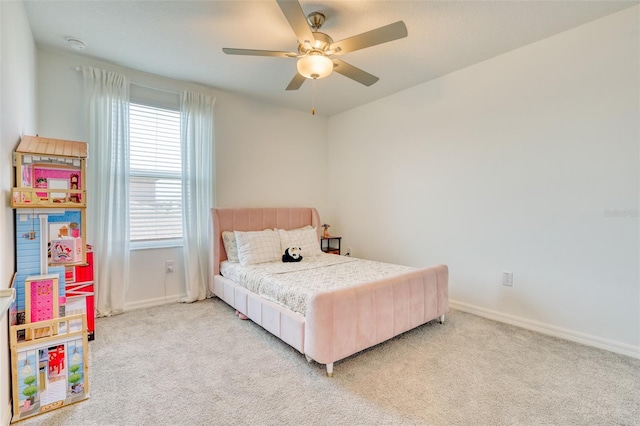 111 Rain Lily Ave, Spring Hill, FL 34609 - carpeted bedroom with baseboards and a ceiling fan