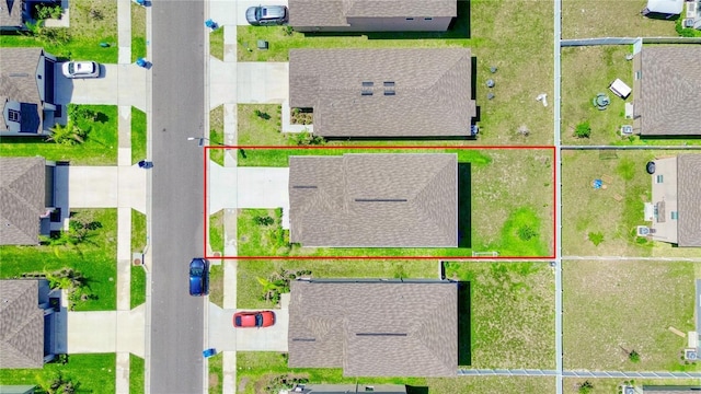 111 Rain Lily Ave, Spring Hill, FL 34609 - aerial view of residential area with property boundaries highlighted