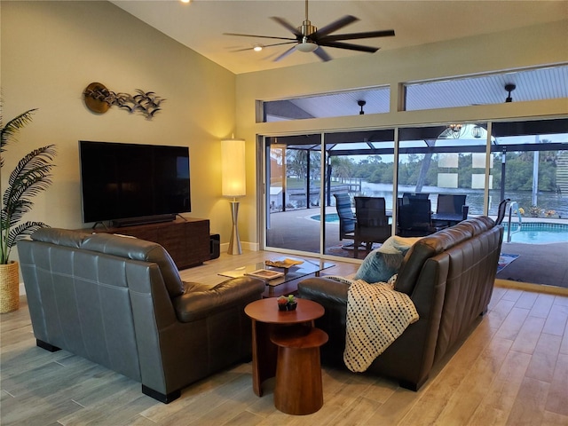 4216 Bur St, Port Charlotte, FL 33948 - living room with a ceiling fan, light wood finished floors, lofted ceiling, and recessed lighting