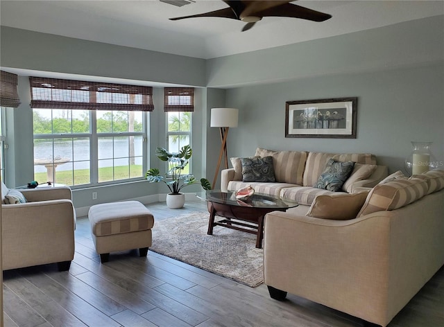 4216 Bur St, Port Charlotte, FL 33948 - living area with ceiling fan, wood finished floors, and baseboards