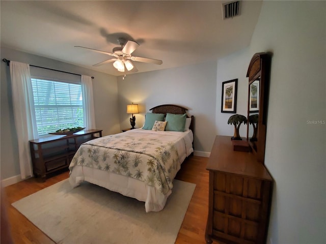 4216 Bur St, Port Charlotte, FL 33948 - bedroom with wood finished floors, baseboards, and ceiling fan
