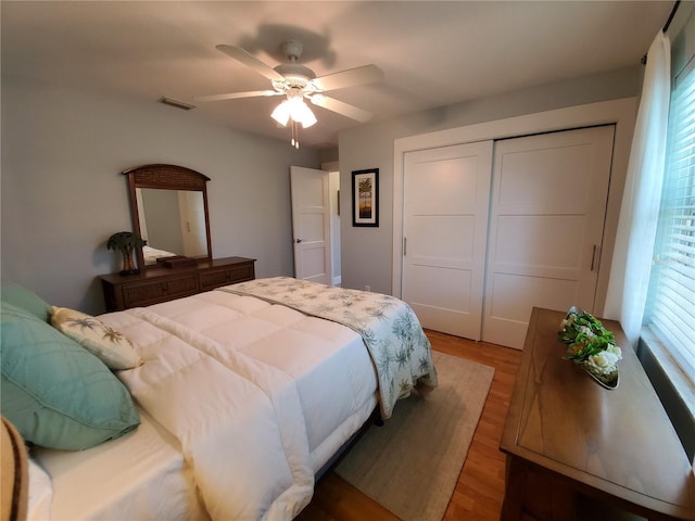 4216 Bur St, Port Charlotte, FL 33948 - bedroom featuring a closet, light wood finished floors, and ceiling fan