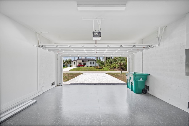 17197 Russell Ave, Port Charlotte, FL 33954 - garage with a garage door opener and concrete block wall