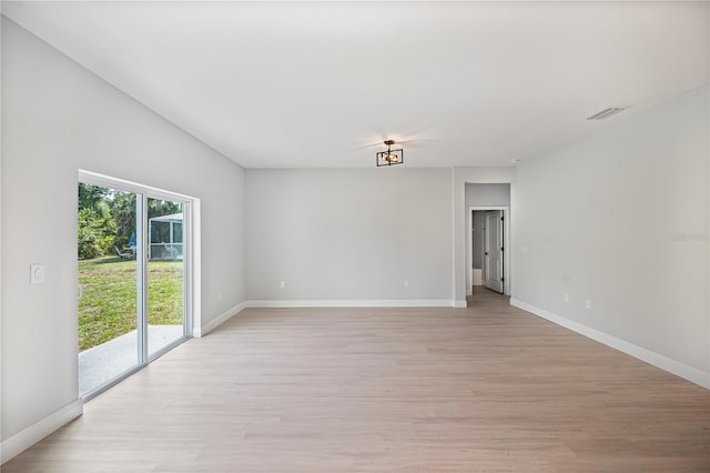 17197 Russell Ave, Port Charlotte, FL 33954 - spare room featuring light wood-type flooring and baseboards