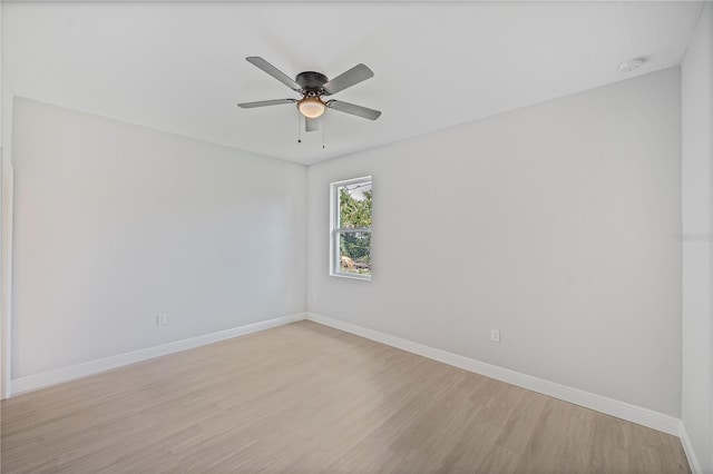 17197 Russell Ave, Port Charlotte, FL 33954 - unfurnished room featuring light wood-style flooring, baseboards, ceiling fan, and a smoke detector