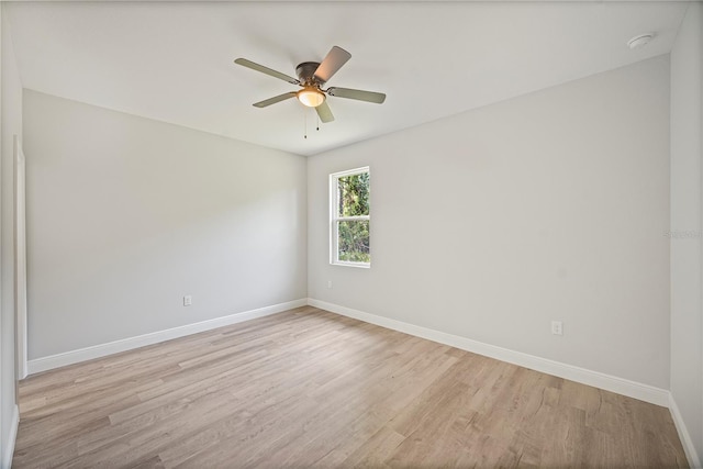 16218 Chamberlain Blvd, Port Charlotte, FL 33954 - unfurnished room with baseboards, light wood-style floors, a smoke detector, and a ceiling fan