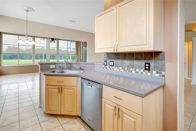 10263 Shadow Run Cir, Punta Gorda, FL 33955 - kitchen with dishwasher, a sink, light tile patterned flooring, tasteful backsplash, and a chandelier