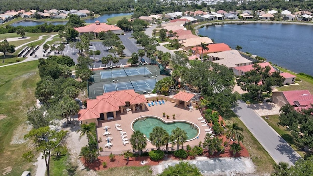 10263 Shadow Run Cir, Punta Gorda, FL 33955 - aerial view of property and surrounding area featuring a large body of water, nearby suburban area, and a pool