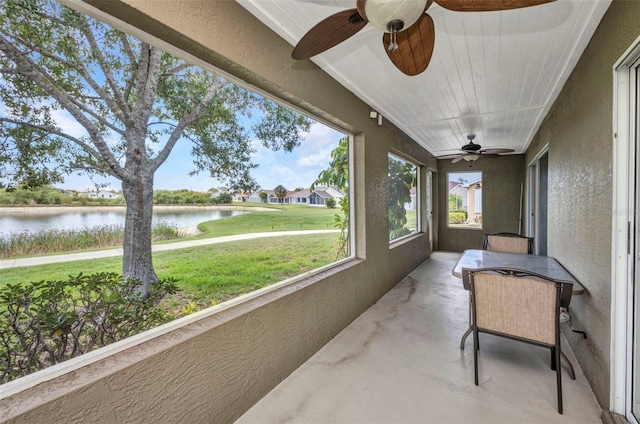 1876 Birmingham Blvd, Punta Gorda, FL 33980 - sunroom / solarium featuring a ceiling fan and a water view