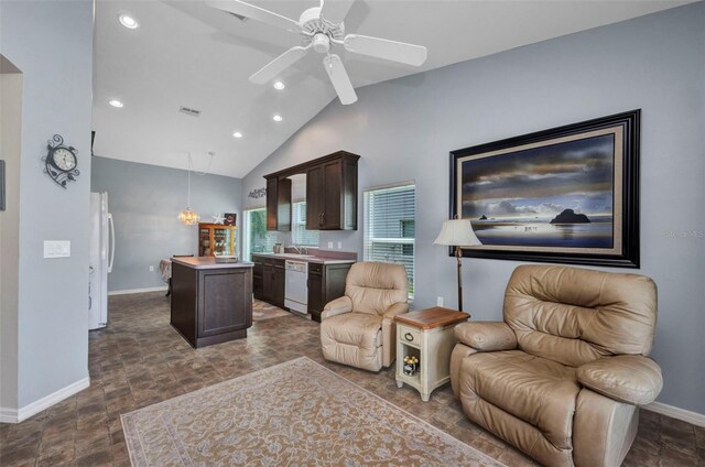 1876 Birmingham Blvd, Punta Gorda, FL 33980 - living room with baseboards, recessed lighting, a ceiling fan, lofted ceiling, and stone finish flooring