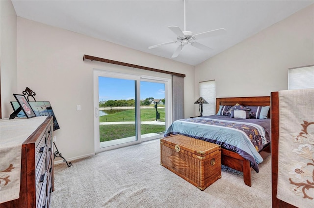 1876 Birmingham Blvd, Punta Gorda, FL 33980 - bedroom with access to outside, carpet flooring, vaulted ceiling, a water view, and baseboards