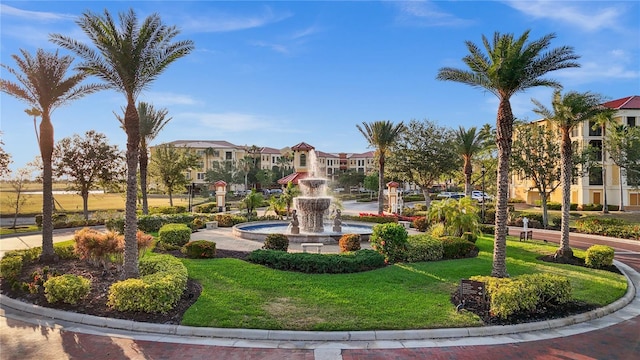 99 Vivante Blvd Unit 310, Punta Gorda, FL 33950 - view of property's community featuring a residential view and a lawn