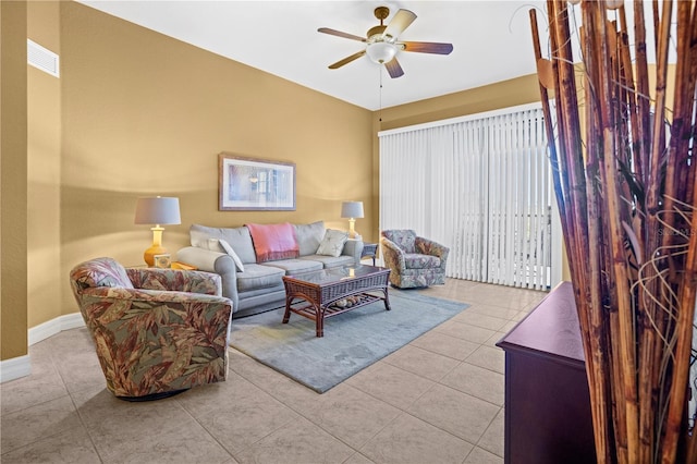 99 Vivante Blvd Unit 310, Punta Gorda, FL 33950 - living area with ceiling fan, baseboards, and tile patterned floors