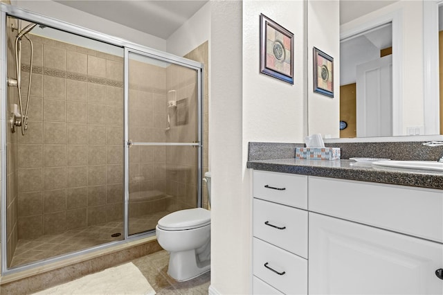 99 Vivante Blvd Unit 310, Punta Gorda, FL 33950 - full bathroom with toilet, vanity, a shower stall, and tile patterned flooring