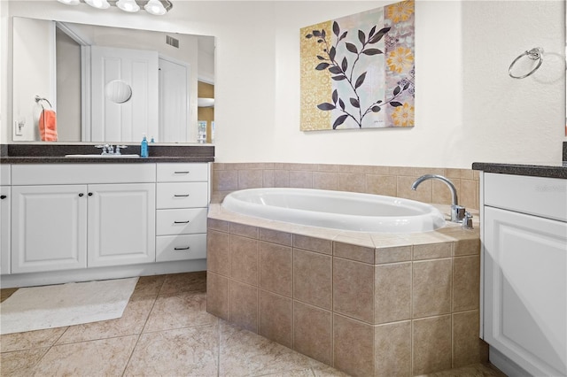 99 Vivante Blvd Unit 310, Punta Gorda, FL 33950 - full bath with vanity, a garden tub, and tile patterned floors