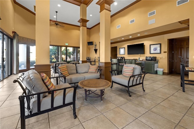 99 Vivante Blvd Unit 310, Punta Gorda, FL 33950 - community lobby with crown molding, a high ceiling, and recessed lighting
