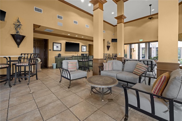 99 Vivante Blvd Unit 310, Punta Gorda, FL 33950 - common area featuring ornamental molding and a towering ceiling