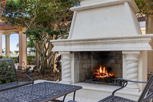 99 Vivante Blvd Unit 310, Punta Gorda, FL 33950 - detailed view of a lit fireplace and decorative columns