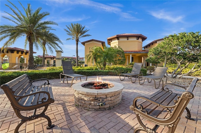 99 Vivante Blvd Unit 310, Punta Gorda, FL 33950 - view of patio / terrace with a fire pit