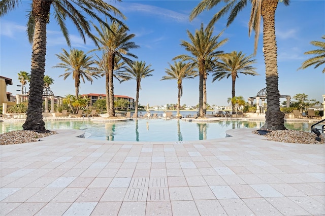 99 Vivante Blvd Unit 310, Punta Gorda, FL 33950 - community pool featuring a patio area