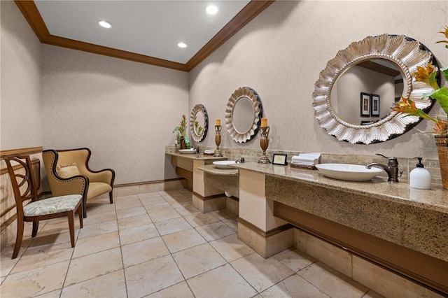 99 Vivante Blvd Unit 310, Punta Gorda, FL 33950 - bathroom featuring crown molding, double vanity, and recessed lighting