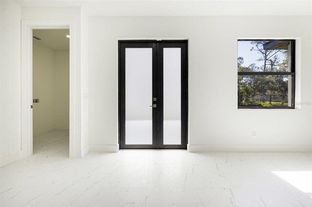 355 Milton St, Port Charlotte, FL 33954 - empty room with marble finish floors and baseboards