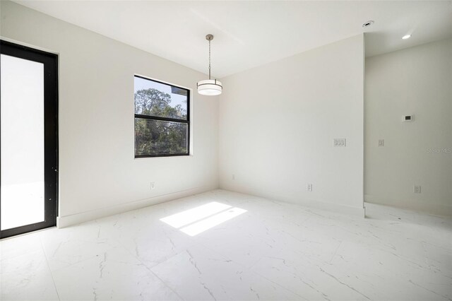 355 Milton St, Port Charlotte, FL 33954 - spare room featuring marble finish floors, recessed lighting, and baseboards