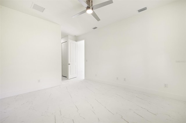 355 Milton St, Port Charlotte, FL 33954 - unfurnished room with a ceiling fan, marble finish floors, and baseboards