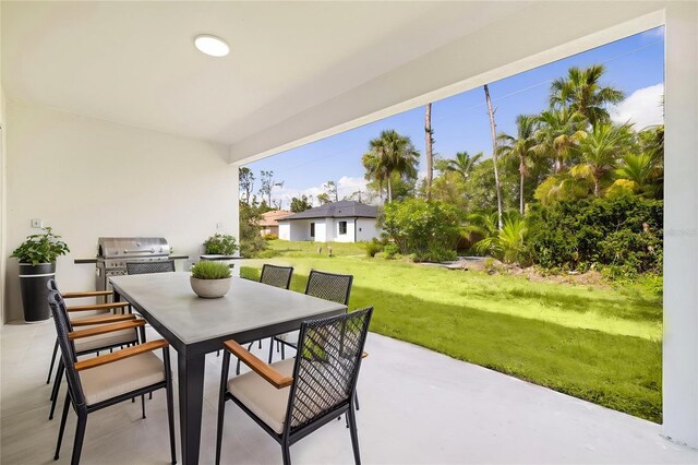 355 Milton St, Port Charlotte, FL 33954 - view of patio featuring outdoor dining space