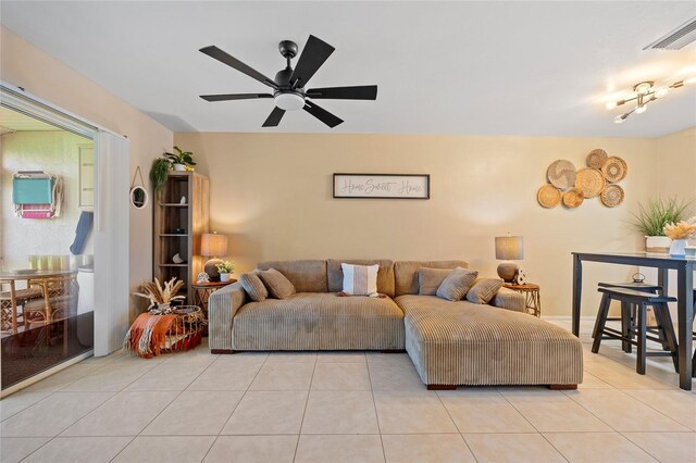 12538 SW Kingsway Cir Unit 1503, Lake Suzy, FL 34269 - living room featuring tile patterned flooring and ceiling fan