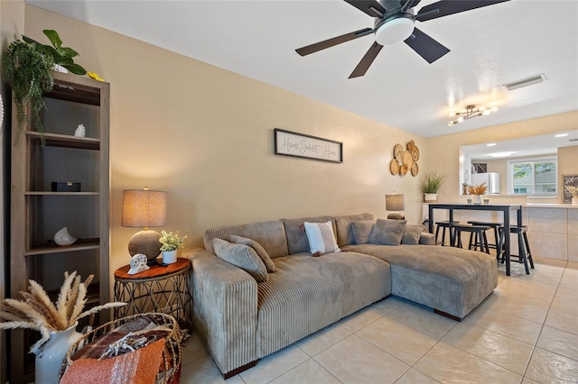 12538 SW Kingsway Cir Unit 1503, Lake Suzy, FL 34269 - living room with light tile patterned floors and ceiling fan