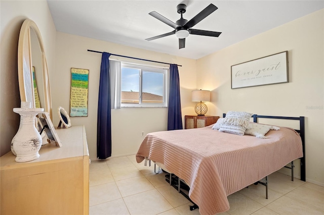 12538 SW Kingsway Cir Unit 1503, Lake Suzy, FL 34269 - tiled bedroom featuring baseboards and a ceiling fan